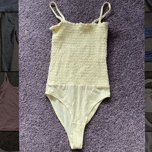 Yellow Smocked Bodysuit